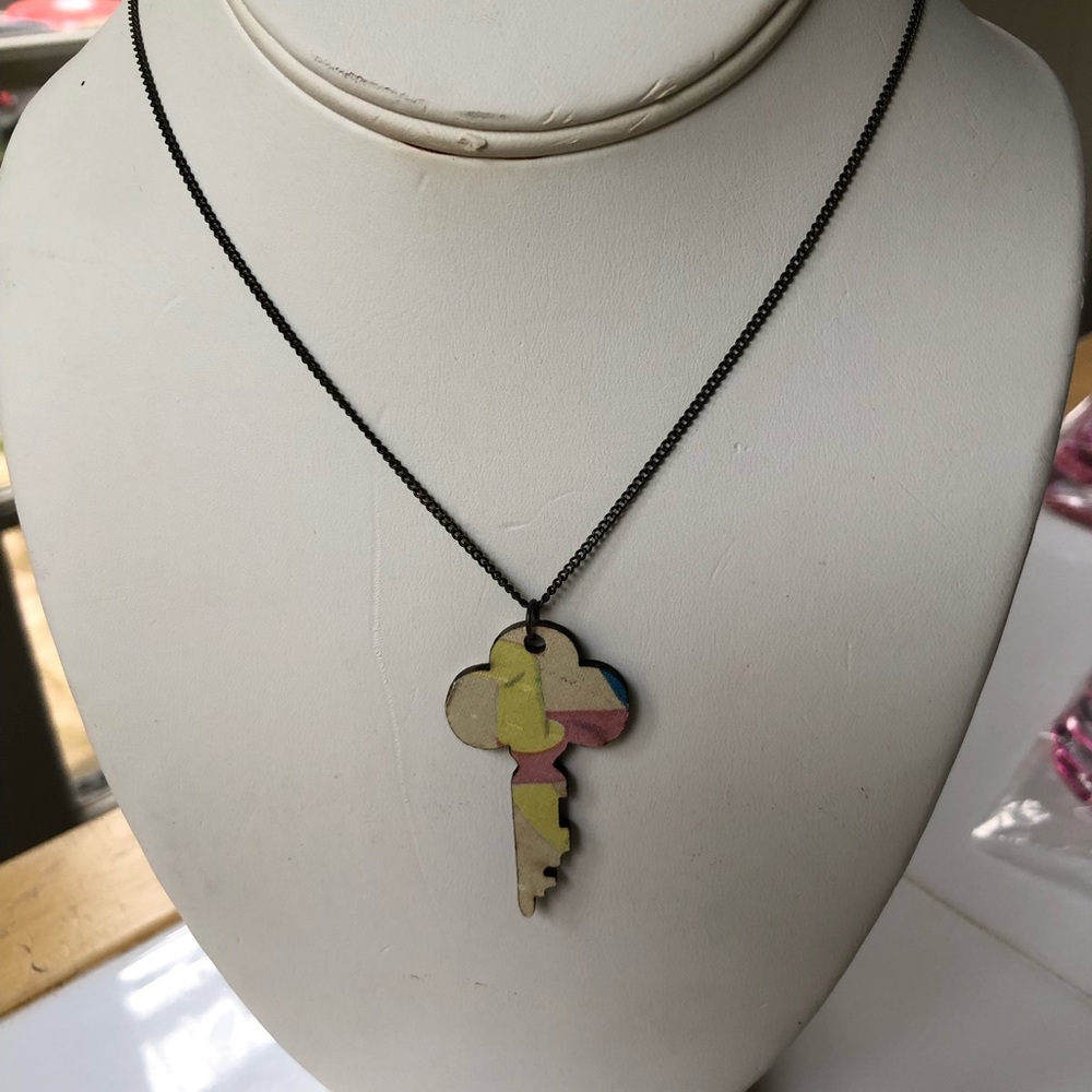 NWT Key shaped pendant necklace on 30” chain, made from reclaimed book covers